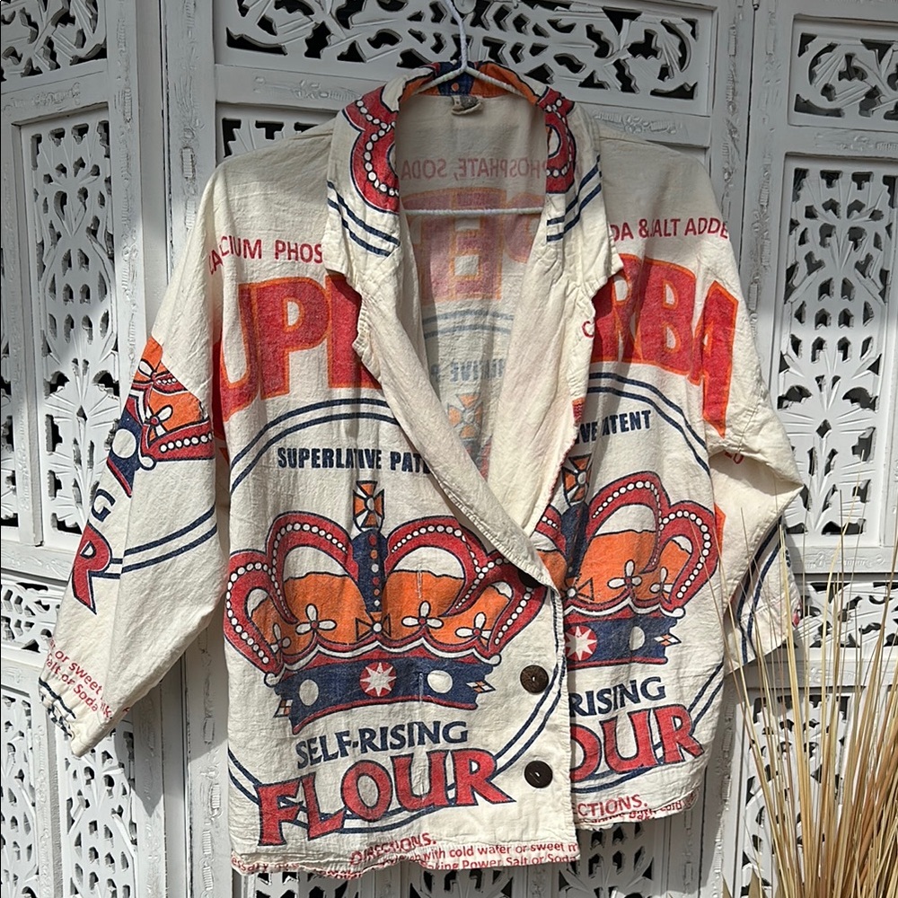 Vintage Graphic button tunic with old fashion flower logo